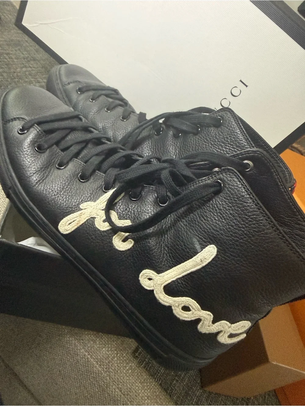 Gucci Black Leather High-Top Sneakers with White Script